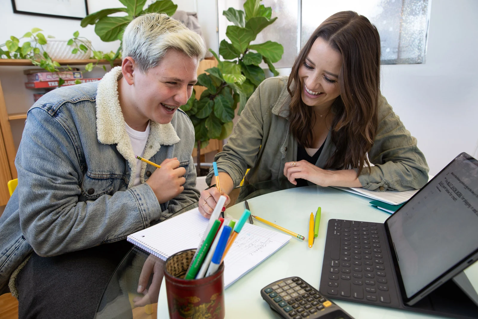 Educator engaging with a student during a learning session.